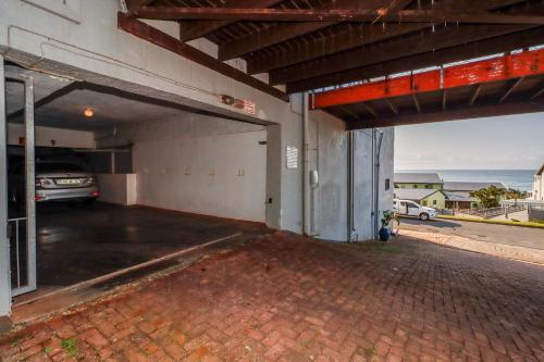 an empty parking garage with a car in it at Ramsgate Mews 2 in Ramsgate