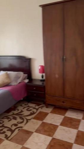 Ένα ή περισσότερα κρεβάτια σε δωμάτιο στο Rue Gibraltar