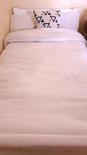 Ένα ή περισσότερα κρεβάτια σε δωμάτιο στο Anna's Bloom and Bed