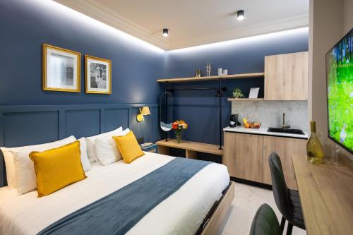 TV a/nebo společenská místnost v ubytování Buena Vista Suites
