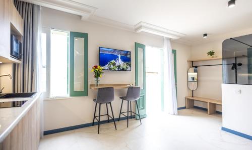 Kuchyň nebo kuchyňský kout v ubytování Buena Vista Suites