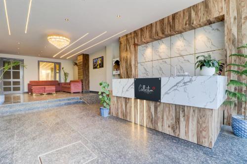a lobby with a map on the wall at Hotel O Gold Inn in Rohtak