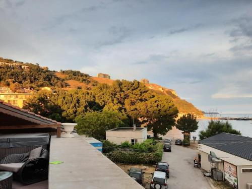 arial view of a town with a mountain in the background at Villa Bellavista in Kavarna