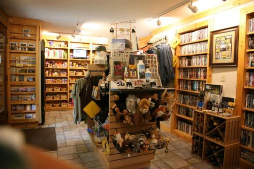 a store with a lot of stuffed animals and books at LOGE Alta Crystal in Enumclaw