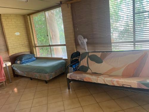 Una cama o camas en una habitación de Joondalup ecu 大学