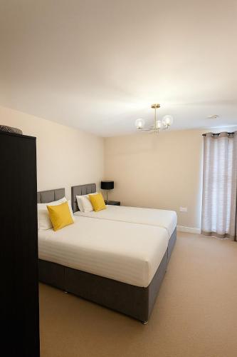Ένα ή περισσότερα κρεβάτια σε δωμάτιο στο Modern 2-Bed Flat, Hatfield, Sleeps up to 4