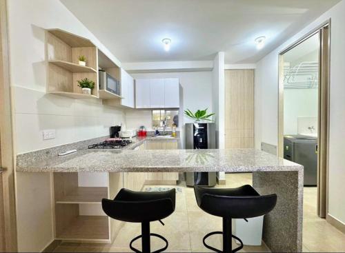 Η κουζίνα ή μικρή κουζίνα στο Lindo apartamento a 5 minutos del mar!!!