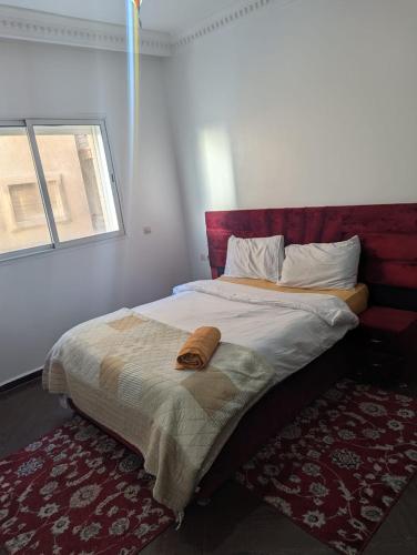 Ένα ή περισσότερα κρεβάτια σε δωμάτιο στο شقة جميلة