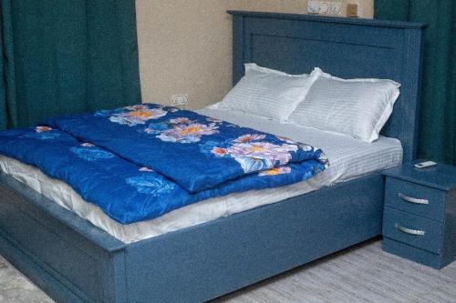 Postel nebo postele na pokoji v ubytování Ramana Suites