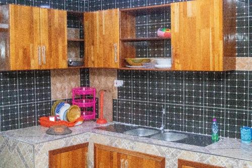 Kuchyň nebo kuchyňský kout v ubytování Ramana Suites
