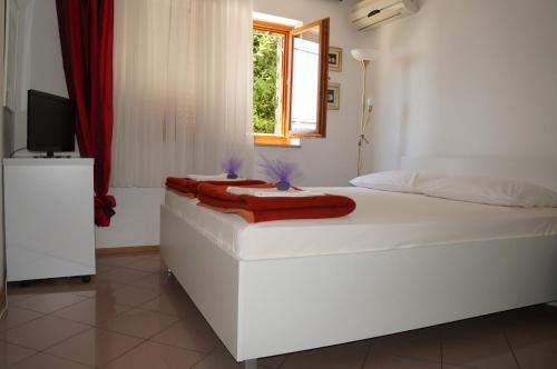 Posteľ alebo postele v izbe v ubytovaní Studio Apartment Novi