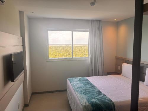 Postel nebo postele na pokoji v ubytování Aqualand resorts