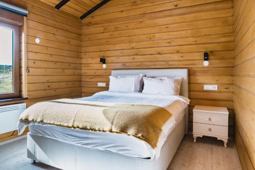 Ein Bett oder Betten in einem Zimmer der Unterkunft Large luxury Cabin On The Golden Circle Next To Kerið The Crater.