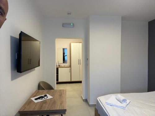 Μια τηλεόραση ή/και κέντρο ψυχαγωγίας στο Hotel Belica
