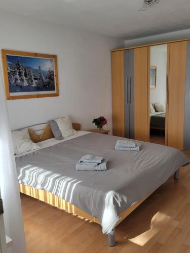 Katil atau katil-katil dalam bilik di Appartement Cosy
