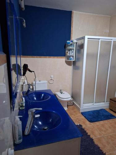 Ένα μπάνιο στο Alojamiento Casa MINSO