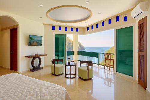 Katil atau katil-katil dalam bilik di South Shore Villa Armonia Luxury Boutique