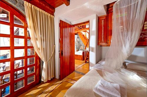 Ένα ή περισσότερα κρεβάτια σε δωμάτιο στο Ferienhaus Penelope In Mavrikiano