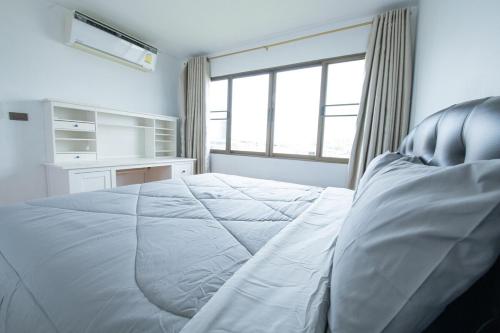Ένα ή περισσότερα κρεβάτια σε δωμάτιο στο 2Bed Room Condo Near iConsiam & BTS Krungthonburi