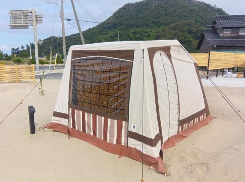 a net in the middle of a tennis court at iwado base in Tottori
