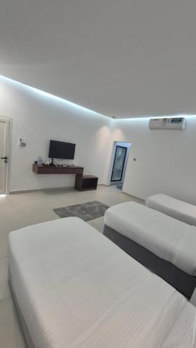 Ένα ή περισσότερα κρεβάτια σε δωμάτιο στο Chalet--J3--شاليه