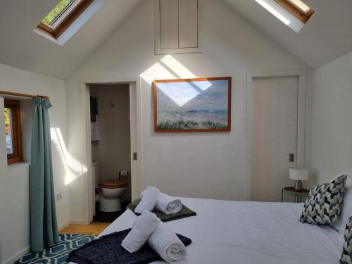 Ένα ή περισσότερα κρεβάτια σε δωμάτιο στο Rose's Cottage, Bucks Mills