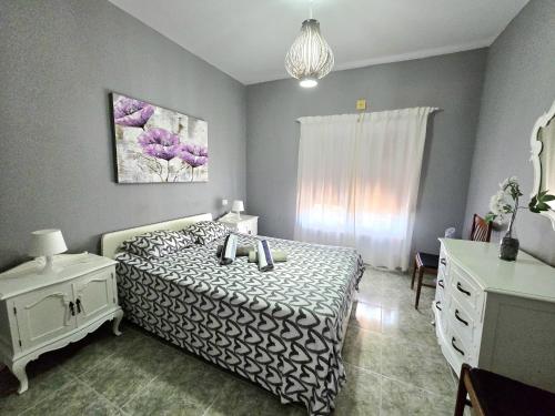 En eller flere senge i et værelse på Apartamentos Medano - Casa Playa