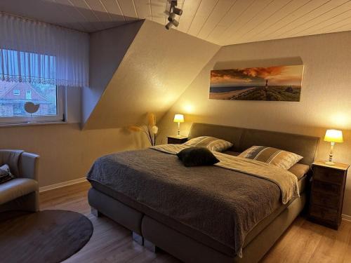 Postel nebo postele na pokoji v ubytování Holiday Apartment Lara Osteel