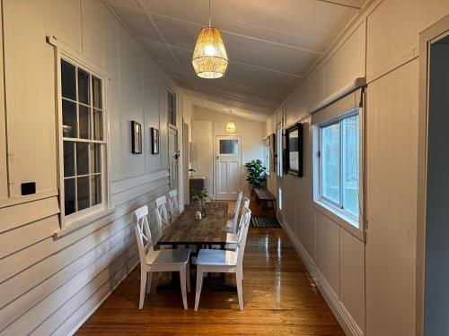 a dining room with a table and chairs at Kookaburra Retreat in Daylesford