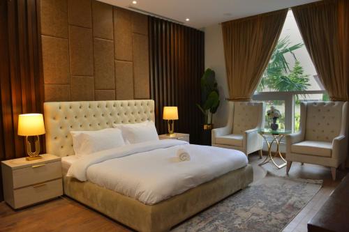 Ένα ή περισσότερα κρεβάτια σε δωμάτιο στο PentaSquare Executive Apartments