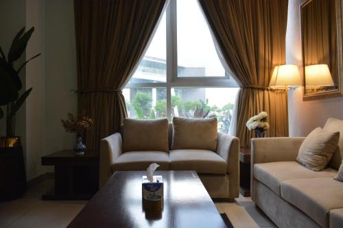 Χώρος καθιστικού στο PentaSquare Executive Apartments