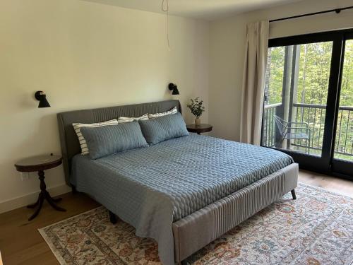 Ένα ή περισσότερα κρεβάτια σε δωμάτιο στο Spacious 5 bedroom Mountain Chalet with Sauna