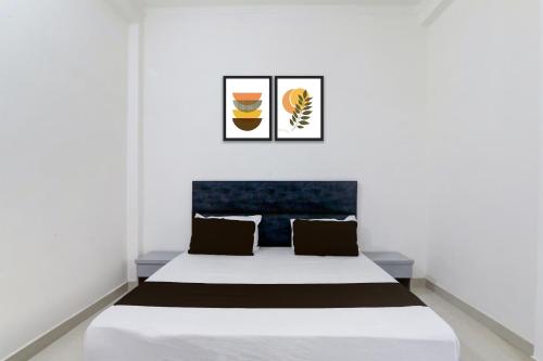 Postel nebo postele na pokoji v ubytování HOTEL O CR GRAND