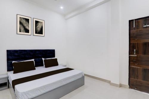 Postel nebo postele na pokoji v ubytování HOTEL O CR GRAND