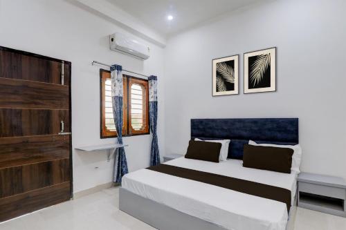 Postel nebo postele na pokoji v ubytování HOTEL O CR GRAND