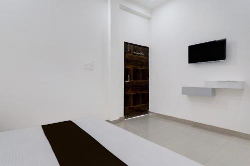 TV a/nebo společenská místnost v ubytování HOTEL O CR GRAND