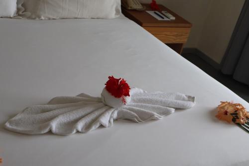 Postel nebo postele na pokoji v ubytování Nalagi Hotel