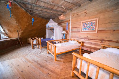 Ένα ή περισσότερα κρεβάτια σε δωμάτιο στο Casa Caribe Hotel