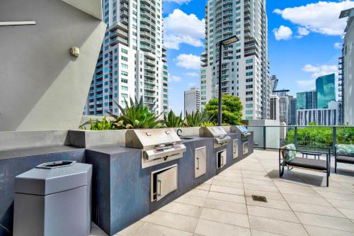 a balcony with a row of sinks and tall buildings at Luxury studio Miami in Miami