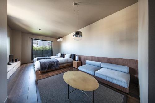 Ένα ή περισσότερα κρεβάτια σε δωμάτιο στο TERRACE tokaichi stay