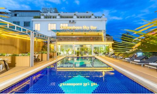 a view of the swimming pool at the embassy reef hotel at Xaysomboun Hotel & SPA in Vientiane