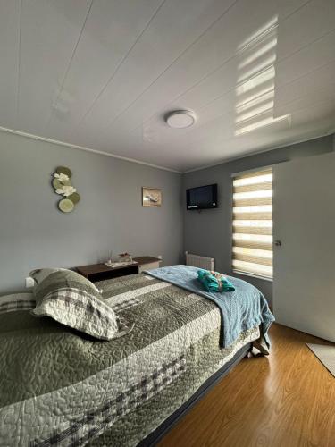 Voodi või voodid majutusasutuse Cabaña full equipada toas