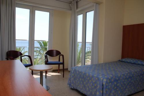 Letto o letti in una camera di Hotel Risech