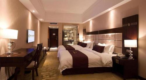 Katil atau katil-katil dalam bilik di Telecom Hotel Guilin