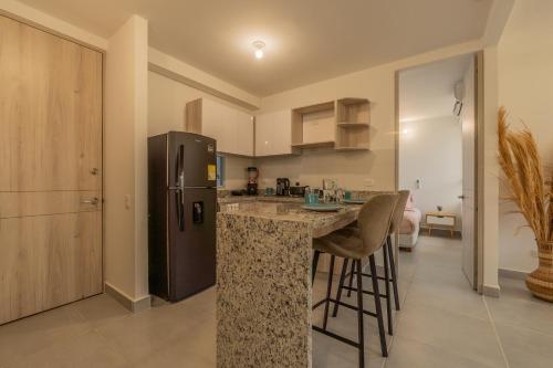 Kuchyň nebo kuchyňský kout v ubytování Family Retreat Apartment-Cartagena, Serena del Mar