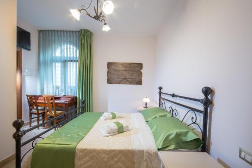 Voodi või voodid majutusasutuse B&B Casa Cavour toas