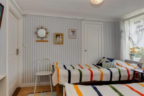 Ένα ή περισσότερα κρεβάτια σε δωμάτιο στο Hus Stabyvägen