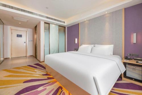 Letto o letti in una camera di Lavande Hotels Jinzhong Youjian Pingyao