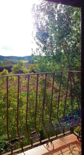 a view from a balcony with a swing at Casa del Rio in Villanueva de la Jara