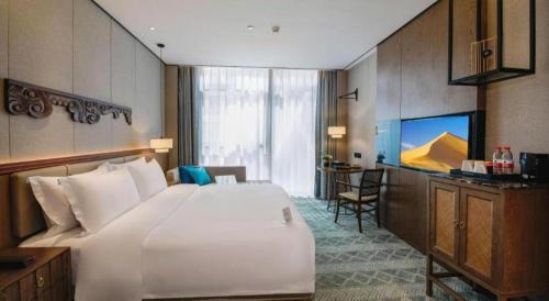 Cama o camas de una habitación en Shenzhen Apex Hotel (Technology Park Branch)
